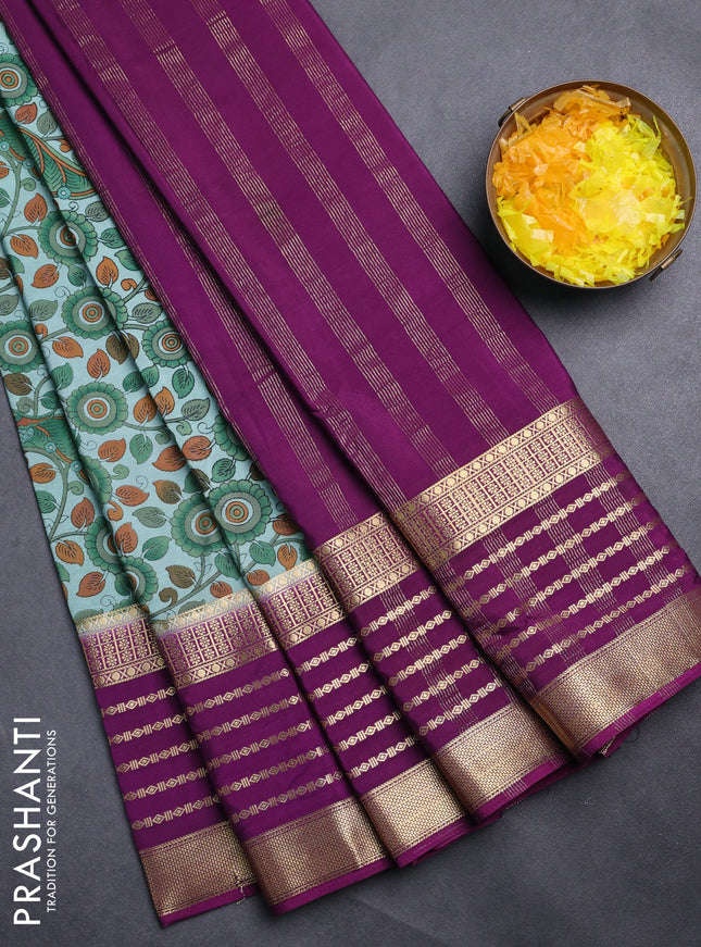 Semi mysore silk saree pastel blue and purple with allover kalamkari prints and long zari woven border