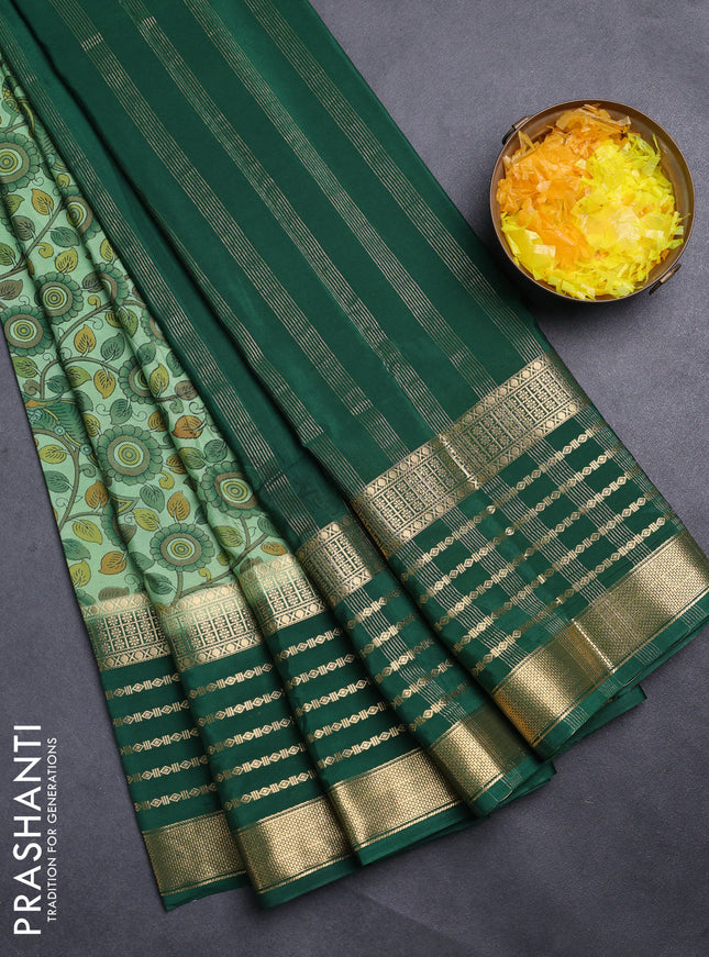 Semi mysore silk saree pastel green and green with allover kalamkari prints and long zari woven border