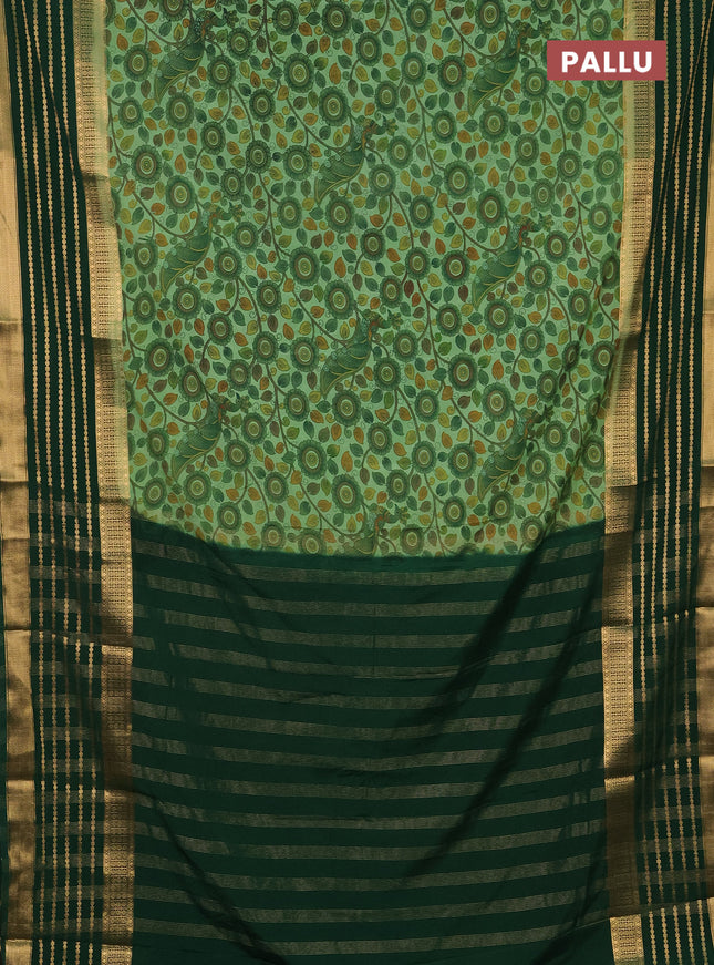 Semi mysore silk saree pastel green and green with allover kalamkari prints and long zari woven border