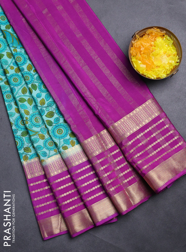 Semi mysore silk saree teal blue and purple with allover kalamkari prints and long zari woven border