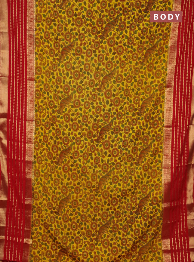 Semi mysore silk saree yellow and red with allover kalamkari prints and long zari woven border