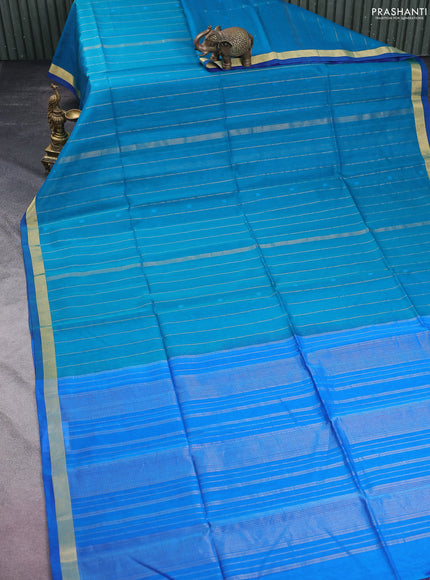 Kora silk cotton saree teal blue and cs blue with allover thread & zari weaves and zari woven border