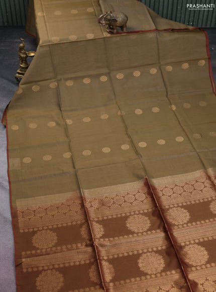 Kora silk cotton saree elaichi green and dual shade of greenish red with zari woven buttas and piping border