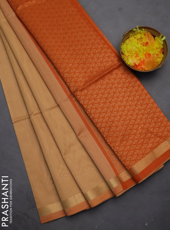 Kora silk cotton saree sandal and orange with zari woven buttas and zari woven border