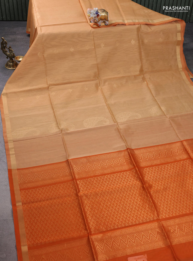 Kora silk cotton saree sandal and orange with zari woven buttas and zari woven border