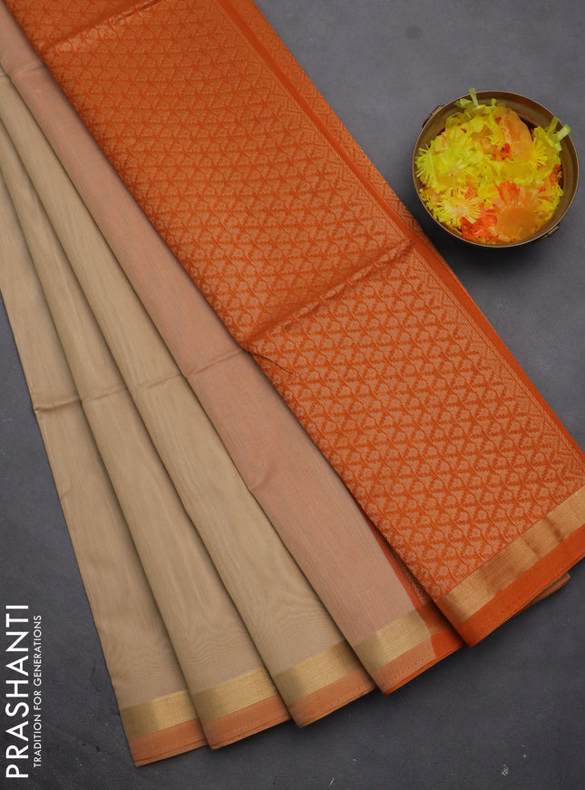 Kora silk cotton saree beige and orange with zari woven buttas and zari woven border
