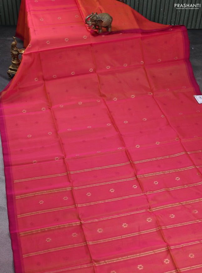 Kora silk cotton saree dual shade of pinkish orange and magenta pink with thread & zari woven geometric buttas and simple border