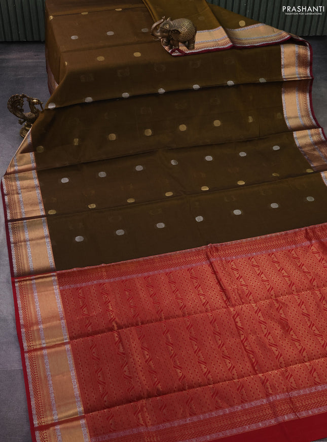 Kora silk cotton saree dark mehendi green and pink with silver & gold zari woven geometric buttas and zari woven border