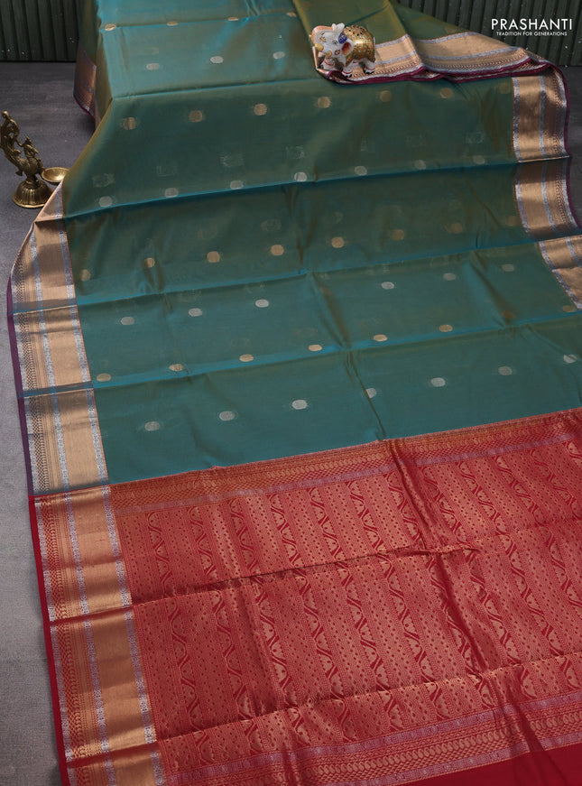 Kora silk cotton saree dual shade of mustard yellowish teal and pink with silver & gold zari woven geometric buttas and zari woven border