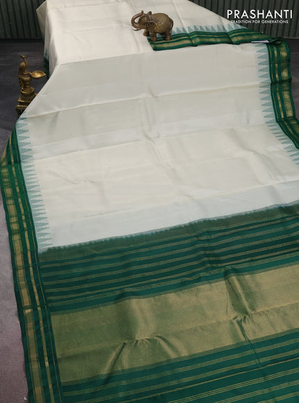 Pure kanchipuram silk saree off white and green with plain body and temple design zari woven border