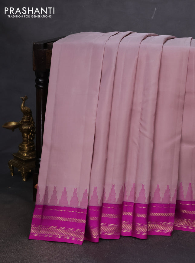 Pure kanchipuram silk saree pastel pink shade with plain body and ganga jamuna border