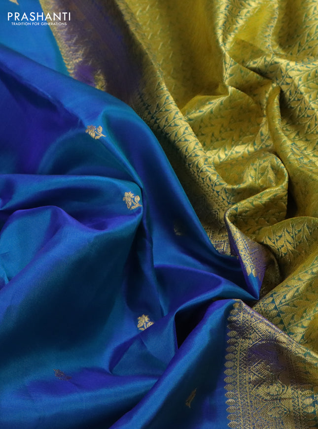 Pure kanchipuram silk saree dual shade of blue and dual shade of light green with zari woven buttas and rich zari woven border