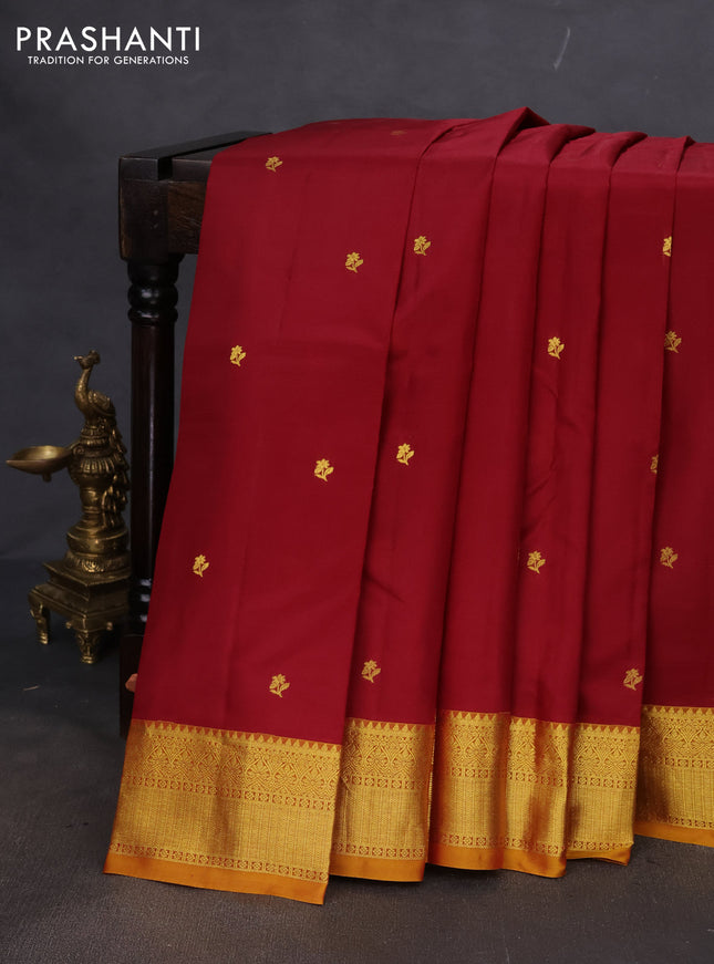 Pure kanchipuram silk saree maroon and dark mustard with zari woven buttas and rich zari woven border