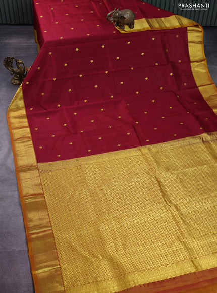Pure kanchipuram silk saree maroon and dark mustard with zari woven buttas and rich zari woven border