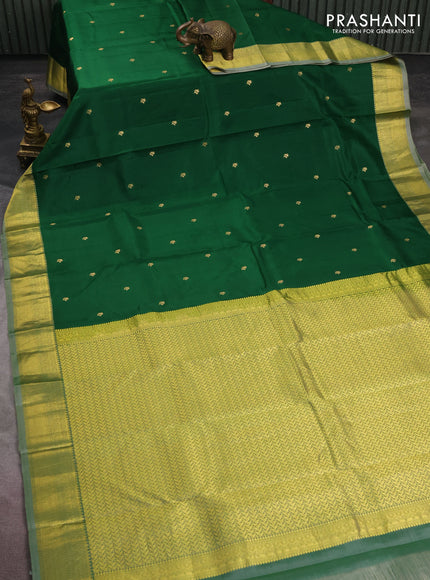 Pure kanchipuram silk saree green and pastel green shade with zari woven buttas and rich zari woven border