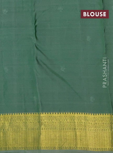 Pure kanchipuram silk saree green and pastel green shade with zari woven buttas and rich zari woven border