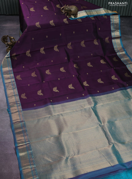 Pure kanchipuram silk saree deep purple and teal blue with zari woven buttas and rich zari woven border