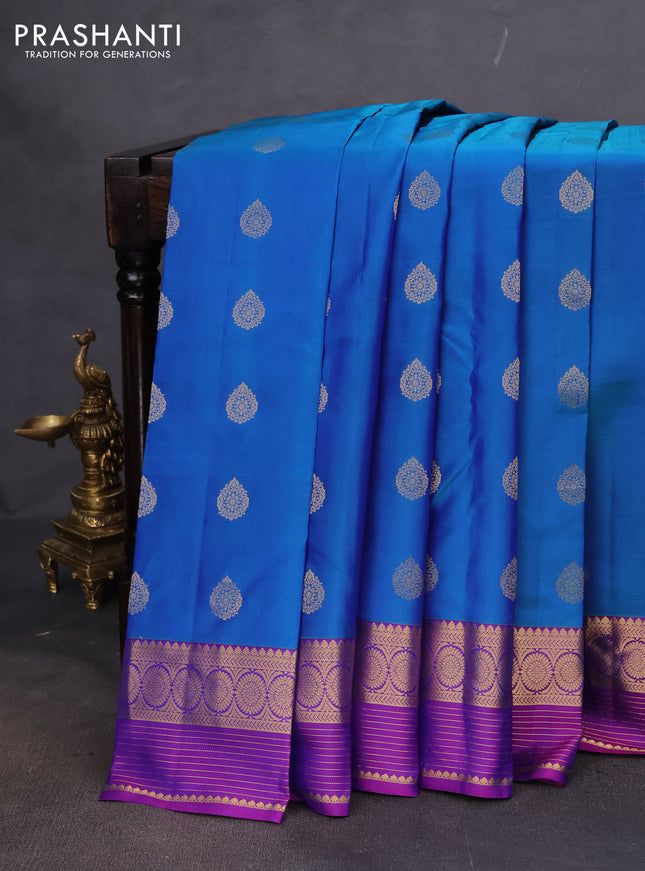 Pure kanchipuram silk saree dual shade of blue and purple with zari woven buttas and rich zari woven border