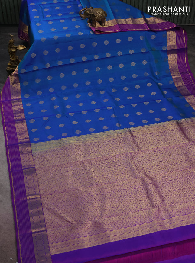 Pure kanchipuram silk saree dual shade of blue and purple with zari woven buttas and rich zari woven border