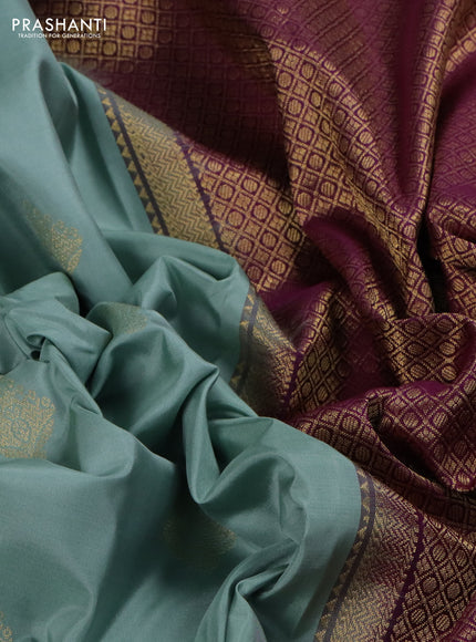 Pure kanchipuram silk saree pastel blue and deep purple with zari woven buttas and rich zari woven border