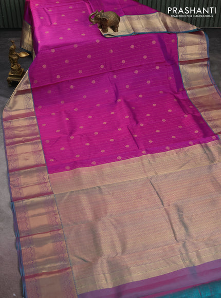 Pure kanchipuram silk saree purple shade and dual shade of teal green with allover zari weaves and rich zari woven border