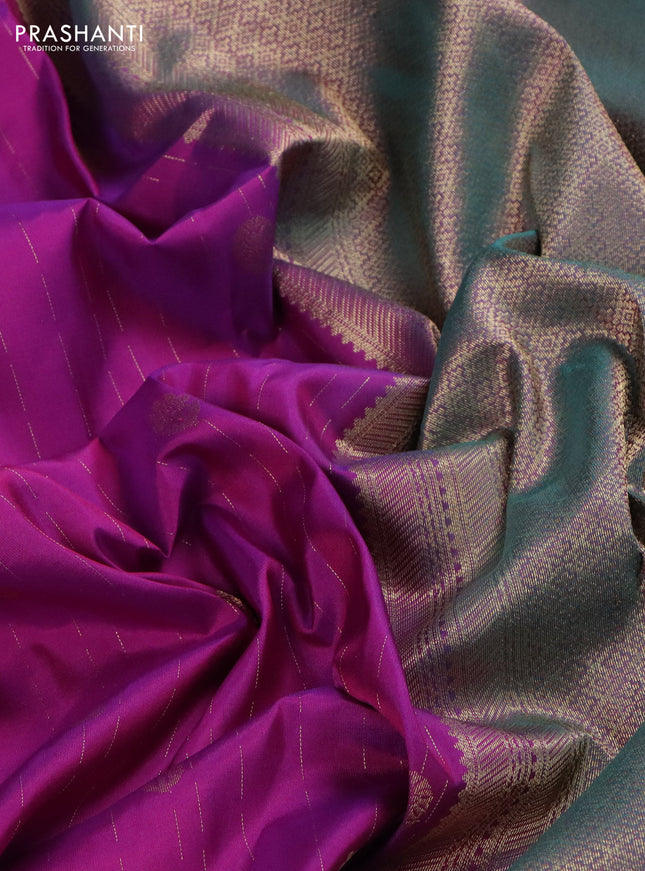 Pure kanchipuram silk saree purple shade and dual shade of teal green with allover zari weaves and rich zari woven border