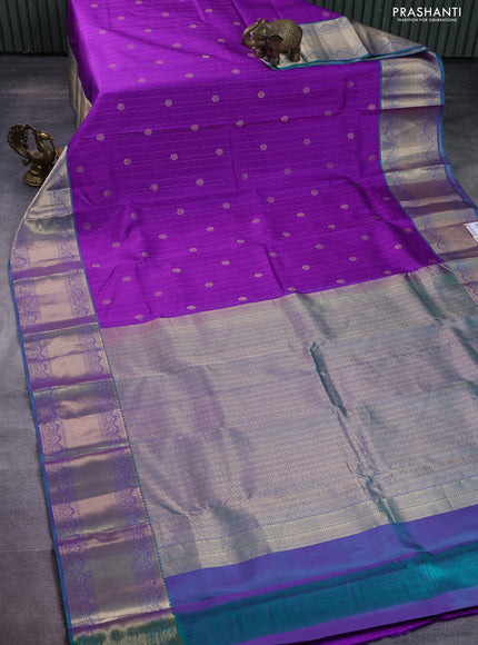 Pure kanchipuram silk saree purple and dual shade of teal with allover zari weaves and rich zari woven border