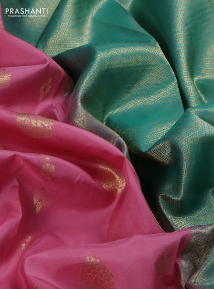 Pure kanchipuram silk saree peach pink and teal green shade with zari woven buttas and zari woven korvai buttas