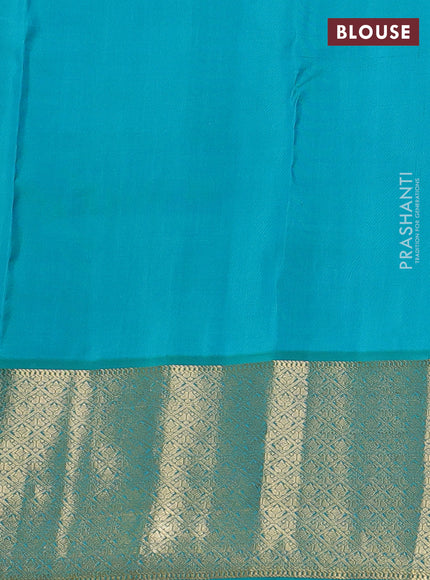 Pure kanchipuram silk saree peach pink and teal green shade with zari woven buttas and zari woven korvai buttas