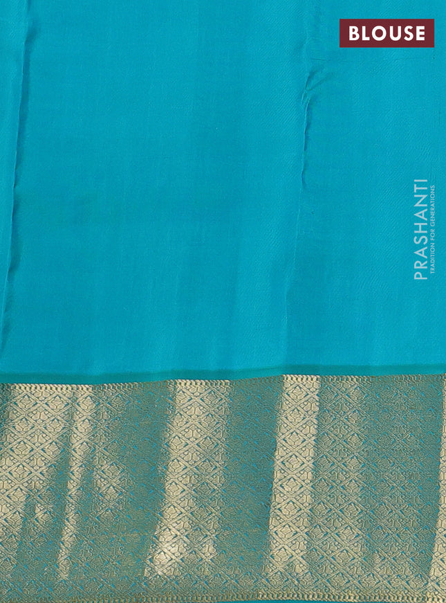 Pure kanchipuram silk saree peach pink and teal green shade with zari woven buttas and zari woven korvai buttas