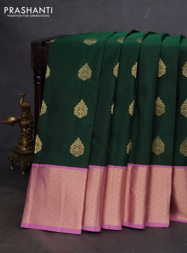 Pure kanchipuram silk saree bottle green and pastel pink with zari woven buttas and zari woven korvai buttas
