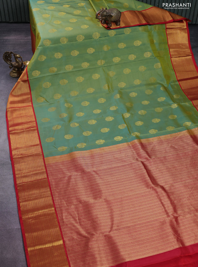Pure kanchipuram silk saree dual shade of green and red with zari woven buttas and zari woven korvai buttas