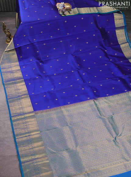 Pure kanchipuram silk saree blue and dual shade of green with zari woven buttas and rich zari woven border