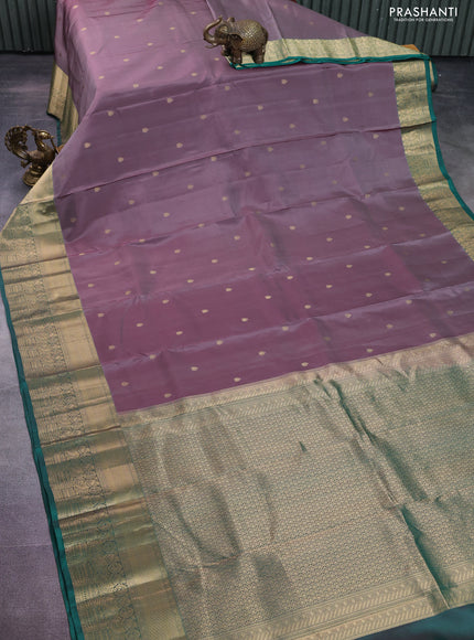 Pure kanchipuram silk saree grey shade and green with zari woven buttas and rich zari woven border