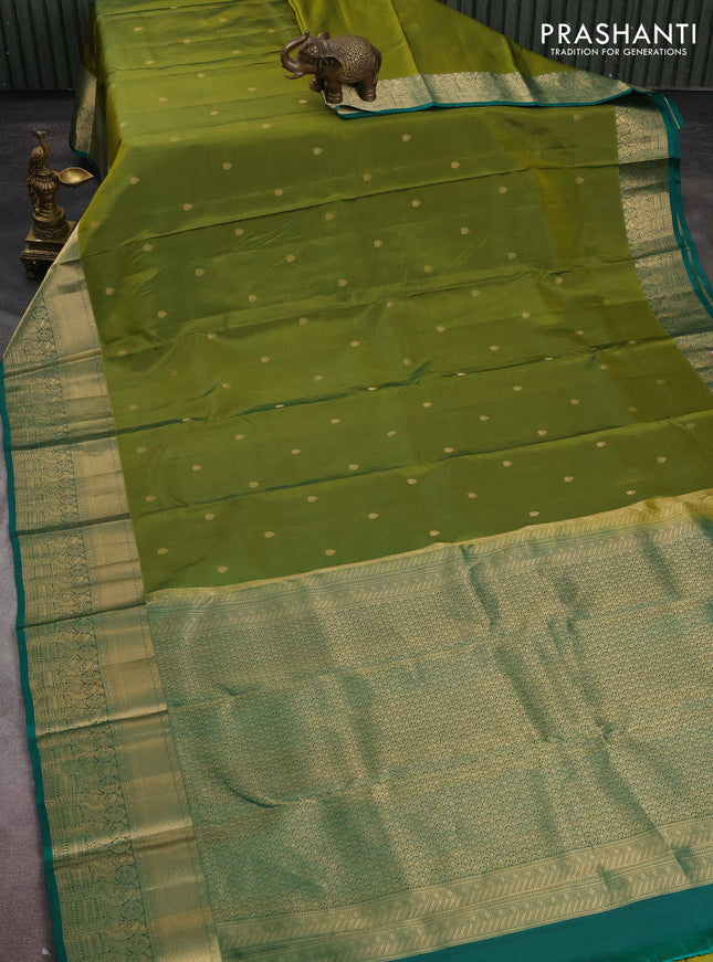 Pure kanchipuram silk saree light green and green with zari woven buttas and rich zari woven border