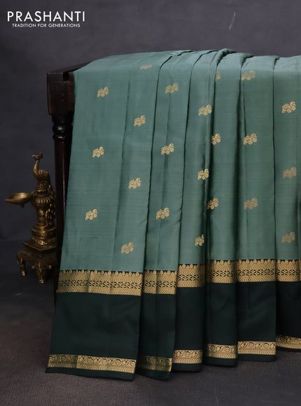 Pure kanchipuram silk saree green and bottle green with zari woven buttas and rettapet zari woven border