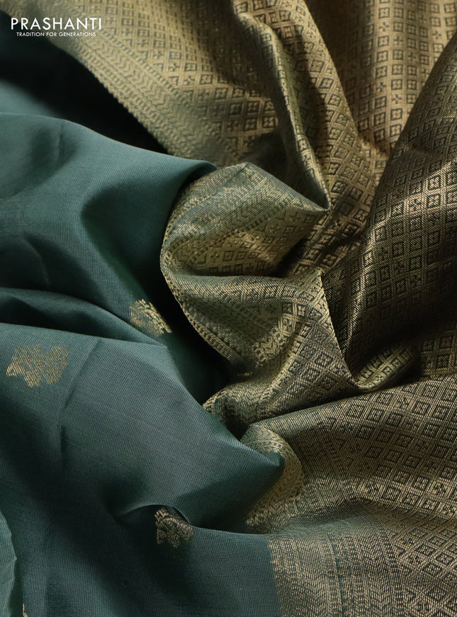 Pure kanchipuram silk saree green and bottle green with zari woven buttas and rettapet zari woven border