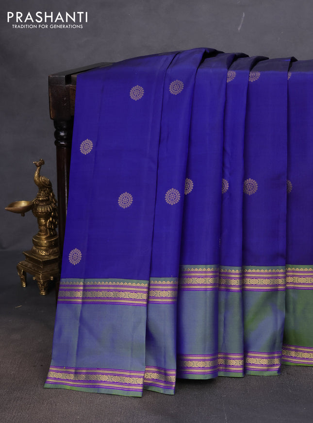 Pure kanchipuram silk saree blue and dual shade of green with zari woven buttas and rettapet zari woven border