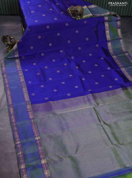 Pure kanchipuram silk saree blue and dual shade of green with zari woven buttas and rettapet zari woven border