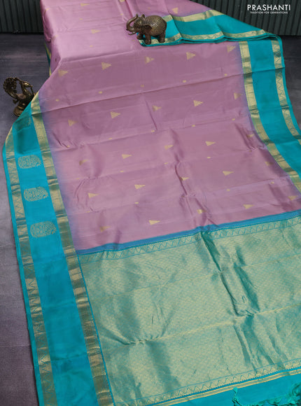 Pure kanchipuram silk saree pastel pink and teal blue with zari woven buttas and long zari woven butta border