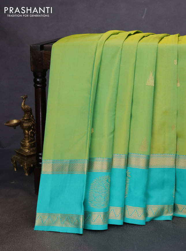 Pure kanchipuram silk saree lime yellow and teal blue with zari woven buttas and long zari woven butta border