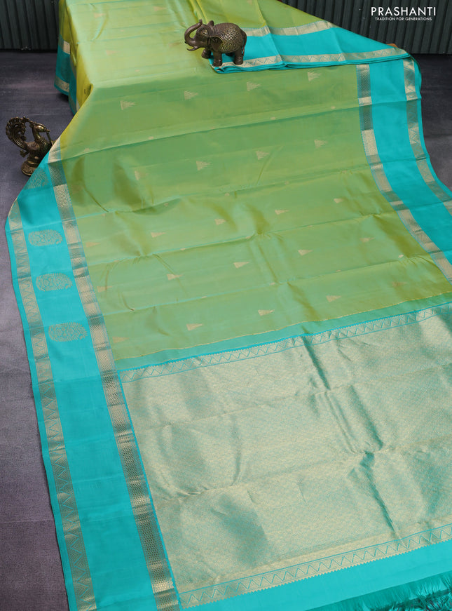 Pure kanchipuram silk saree lime yellow and teal blue with zari woven buttas and long zari woven butta border