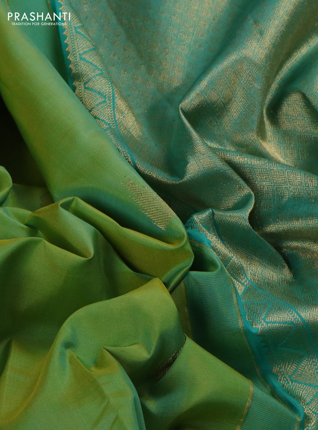 Pure kanchipuram silk saree lime yellow and teal blue with zari woven buttas and long zari woven butta border