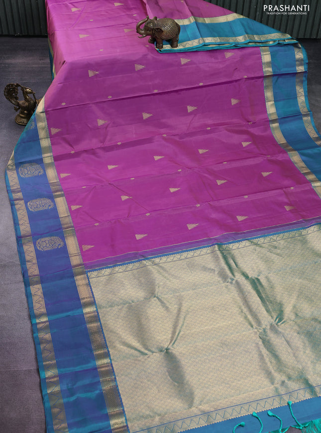 Pure kanchipuram silk saree mild purple and dual shade of teal green with zari woven buttas and long zari woven butta border