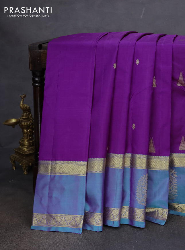 Pure kanchipuram silk saree purple and dual shade of teal green with zari woven buttas and long zari woven butta border