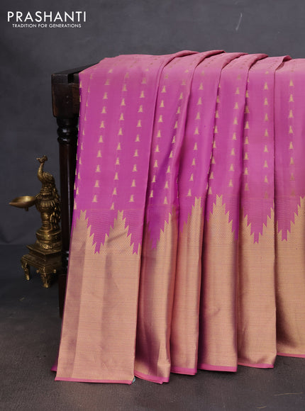Pure kanchipuram silk saree mild lavender and violet with allover zari woven temple buttas and long temple zari woven border