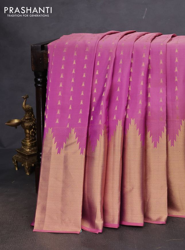 Pure kanchipuram silk saree mild lavender and violet with allover zari woven temple buttas and long temple zari woven border