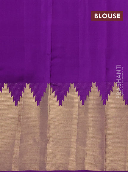 Pure kanchipuram silk saree mild lavender and violet with allover zari woven temple buttas and long temple zari woven border