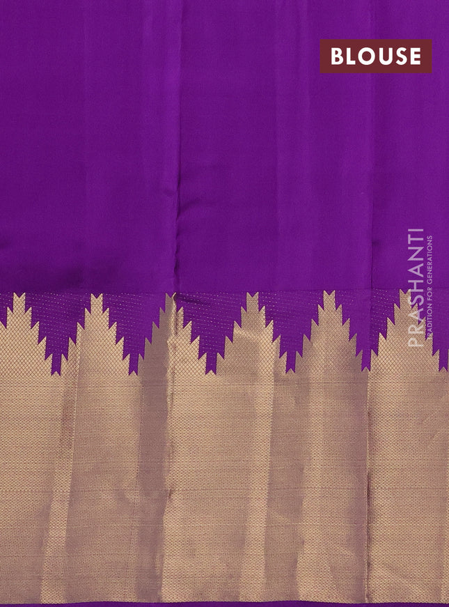 Pure kanchipuram silk saree mild lavender and violet with allover zari woven temple buttas and long temple zari woven border