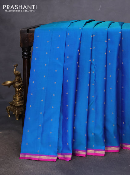 Pure kanchipuram silk saree dual shade of bluish green and purple with allover zari woven 1000 buttas and small zari woven border